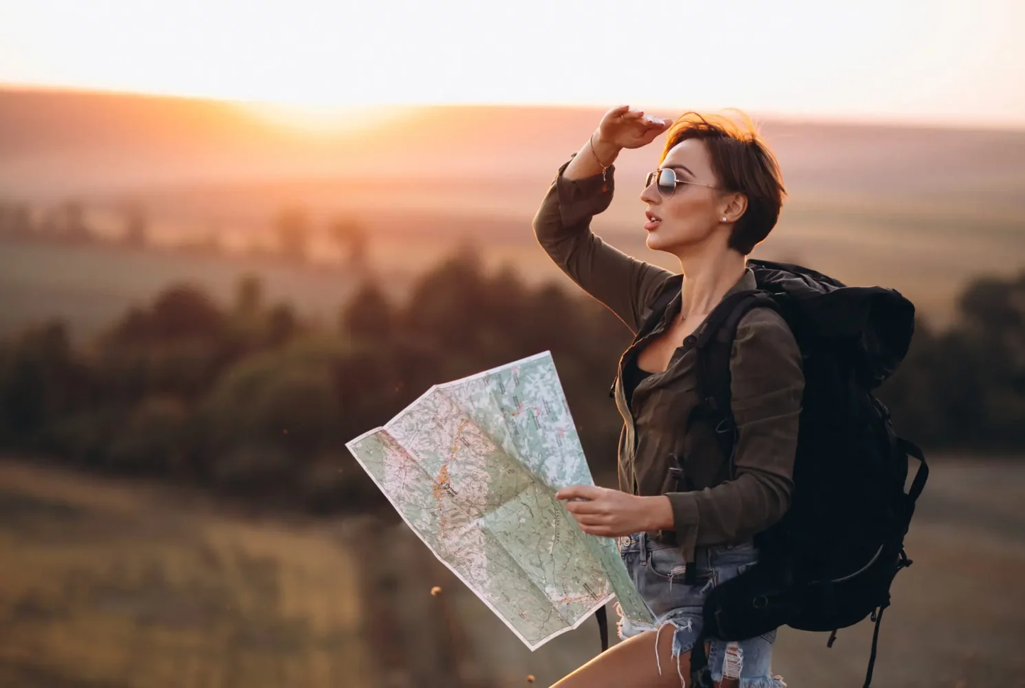 Woman travelling and using map